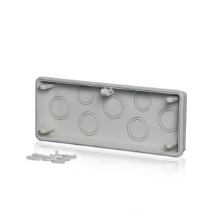 Ein Anbauflansch, aus Polycarbonat mit Befestigungskeilen und Dichtungen, hinter einem transparenten Hintergund.