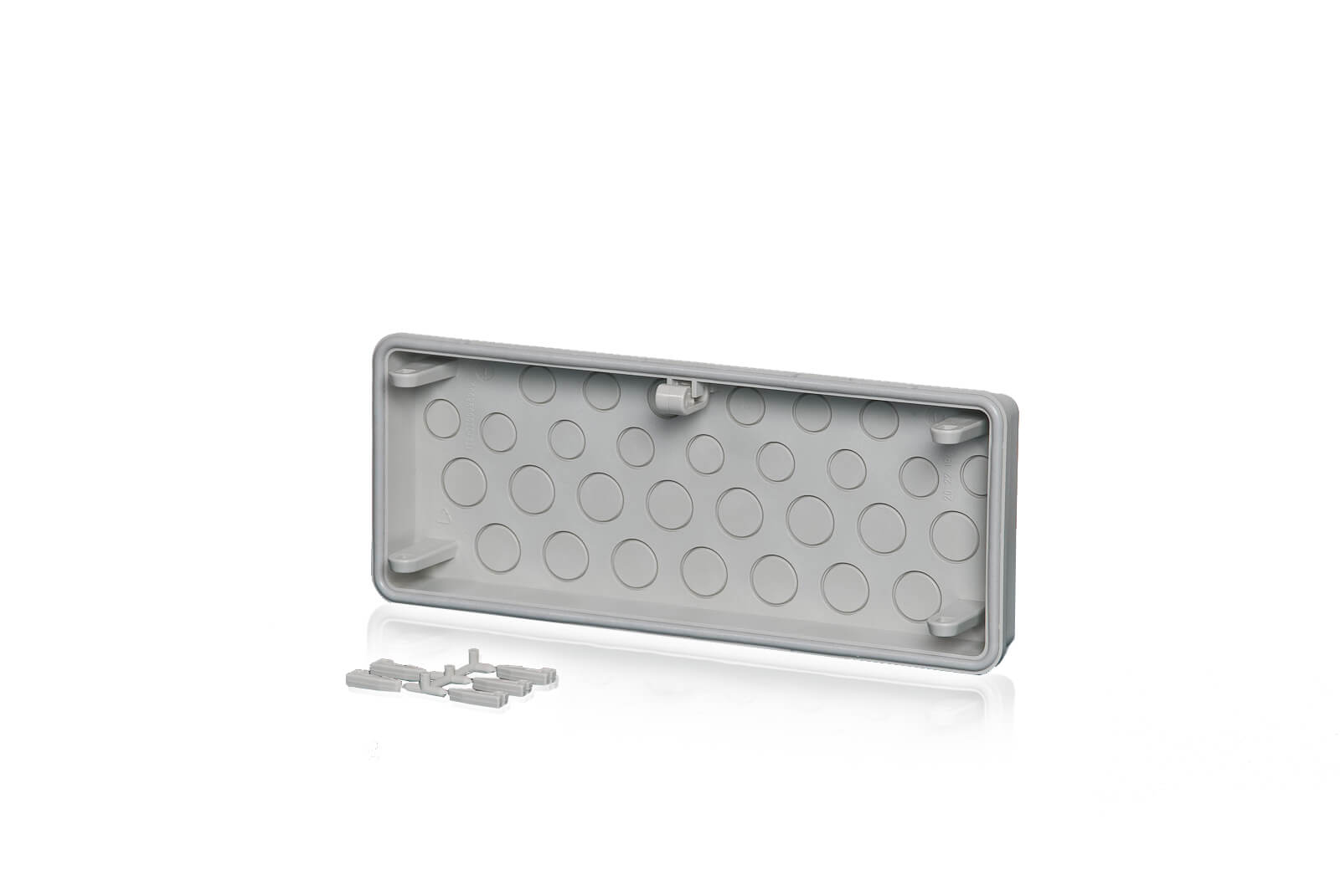 Ein Polycarbonat-Anbauflansch für Gehäusewände hinter einem transparenten Hintergund.